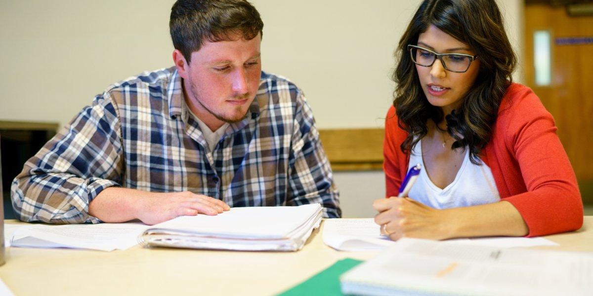 A student meets with a counselor