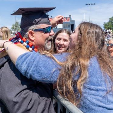 A graduate hutting his family 